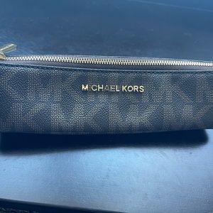 Micheal Kors pencil/pen or makeup holder zipper case.